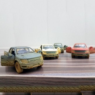 KinSmart SVT Raptor Muddy Car Diecast Model with Openable Doors and Pullback Action Price in Pakistan | LAPTAB