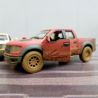 KinSmart SVT Raptor Muddy Car Diecast Model with Openable Doors and Pullback Action