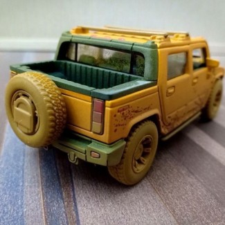 Hummer H2 SUT Muddy 1/40 Scale Die Cast Pull-Back Pickup Truck Model Toy Price in Pakistan | LAPTAB