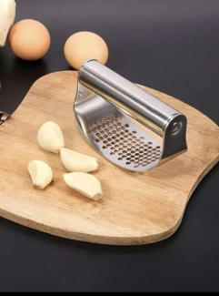 Stainless Steel Garlic Press with Comfortable Plastic Handle for Easy Crushing and Mincing Price in Pakistan | LAPTAB