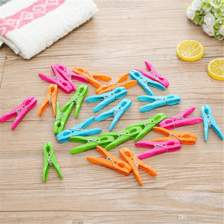 12Pcs Multicolor Cloth Hanging Pegs with Durable Plastic and Stainless Steel Spring Price in Pakistan | LAPTAB