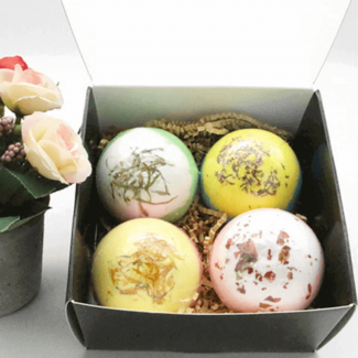 4 pcs Bath Bombs Set - Exfoliating, Moisturizing, Scented Spa Balls for Skin Care Price in Pakistan | LAPTAB