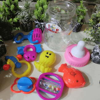 Giant Baby Feeder Bottle with 7 High-Quality Toys and Food Grade Nipple Price in Pakistan | LAPTAB