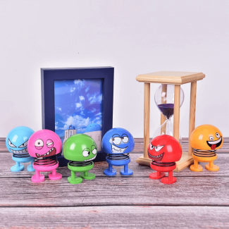 2 Pcs Funny Shaking Head Bouncing Car Pendant Doll for Dashboard Decoration Price in Pakistan | LAPTAB